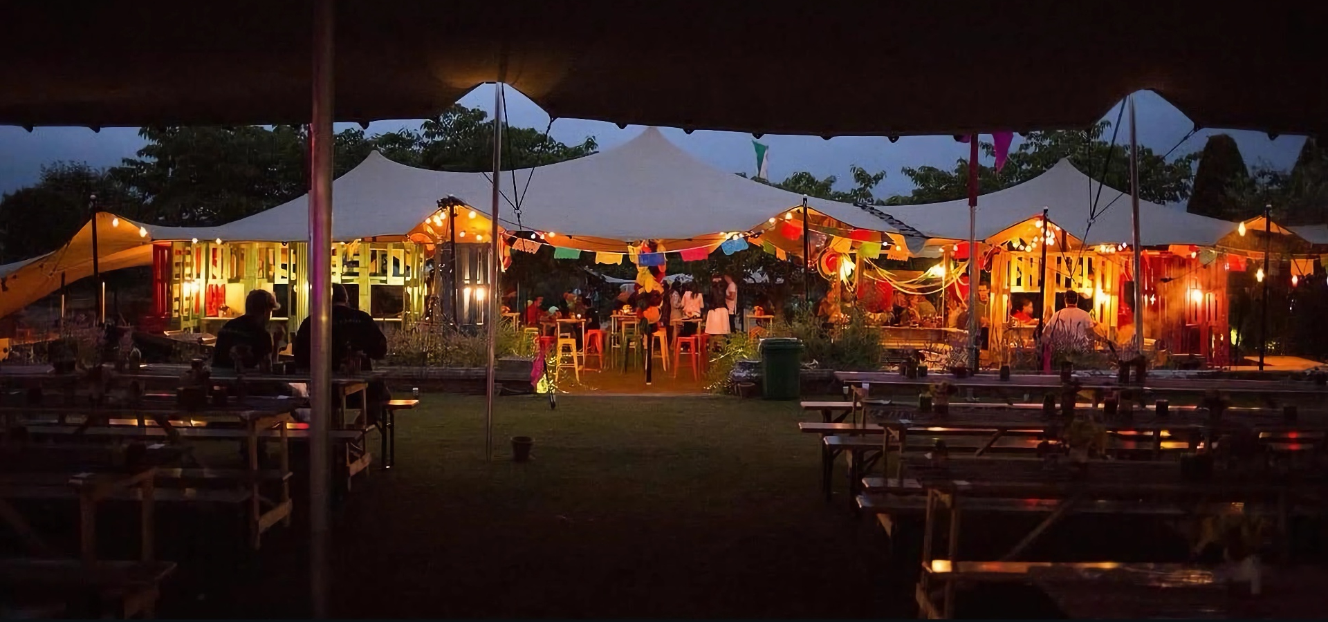 Bedouin stretch tent with flexible outdoor coverage